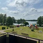 Деревянный коттедж Kameralny Przy Promenadzie - Domki, Apartamenty, Хажуковы